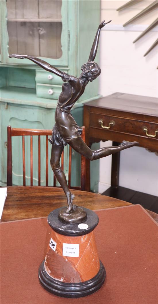 A bronze dancer, signed B. Zach, on marble base overall height 65cm